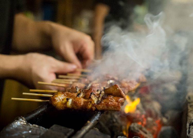 Skilled artisans carefully grill each skewer right in front of customers. (Photo courtesy of Yakitori no Ippei)
