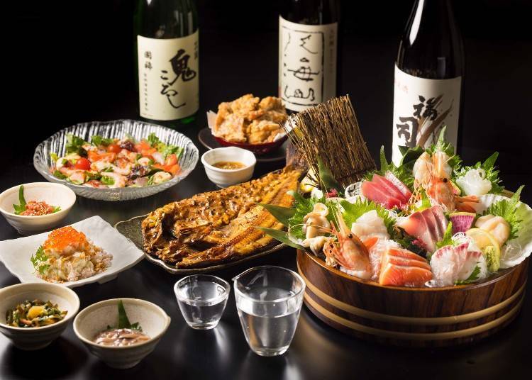 An image of dishes and Japanese sake at Umie. (Photo courtesy of Umie).
