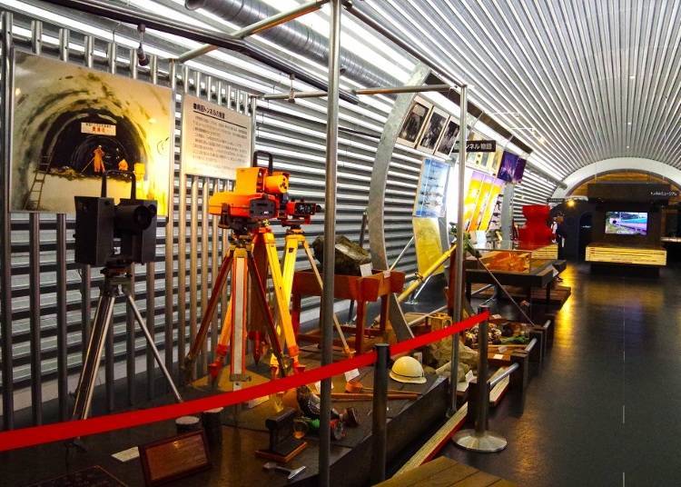 Exhibits include construction equipment and various documents related to the project.