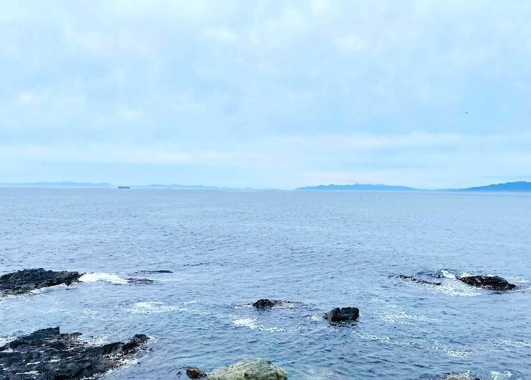 View of the Tsugaru Strait from Cape Shirakami. The land on the right is Tsugaru Peninsula, while the left rear is the Shimokita Peninsula.