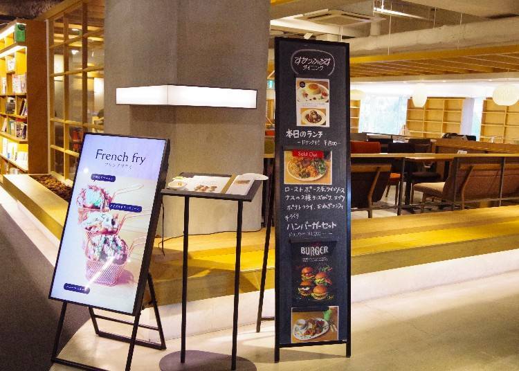 The entrance is in a book-lined section of the bookstore