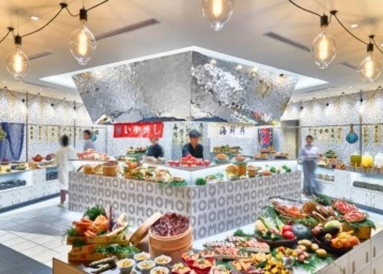 The breakfast venue, 'OMO Dining,' features a bright, lively atmosphere inspired by a market.