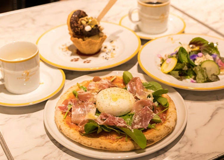 ▲The 'Charlie Brown Special Parmesan Pizza.' It is a luxurious piece (single item, ¥2500), expanding on a scene in which Charlie Brown asks an appetite-less Snoopy "What's missing?" Lunch Course is ¥2800, and Dinner Course is ¥3500. (Image shows Lunch Course)