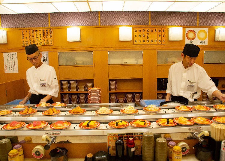 Tasty sushi travels along a conveyor belt