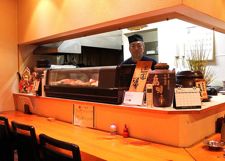 There’s little distance between the chef and the counter seats