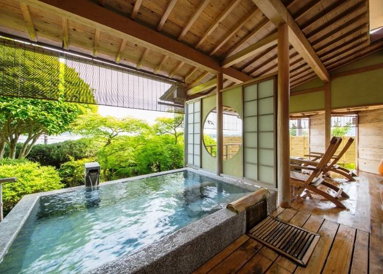 A Japanese room with an outdoor bath on the terrace.