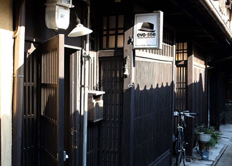 Right across from Oriya Marikiko is the shop marked with a black hat signboard