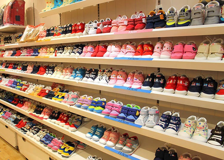 Rows of children’s shoes