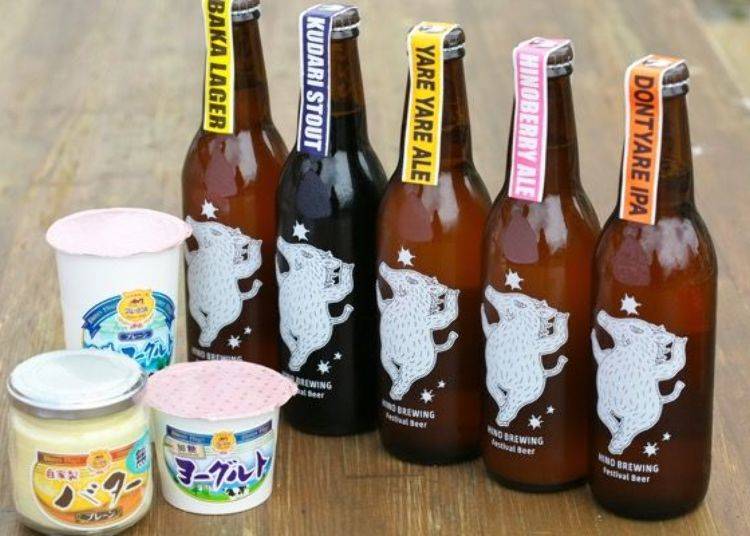 ▲ Drinkable Yogurt Plain (210 yen including tax), Sugar-sweetened Yogurt (230 yen including tax), and butter (850 yen including tax) in the foreground. There are five types of limited quantity craft beer made in Hino Town plus a limited seasonal type (from 600 yen including tax)