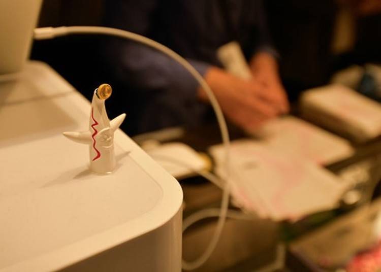 Miniature Tower of the Sun around the table (500 yen, tax included)