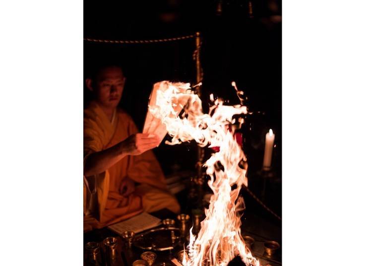 Goma Kito [burning small pieces of holy (scented) wood before a Buddhist altar for spiritual purification]