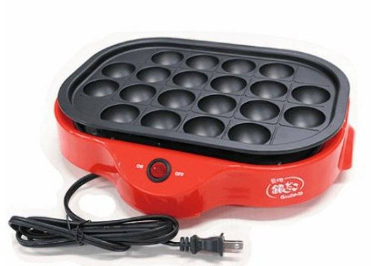 5. Takoyaki cooker with guiding grooves