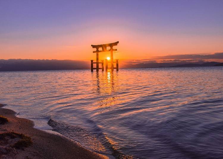 3. Shirahige Shrine (Shiga): A fantasy-like view of temple gates floating on the waters of Lake Biwa