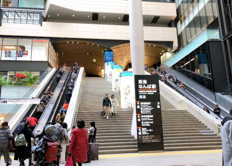 Go up this escalator to reach the platform