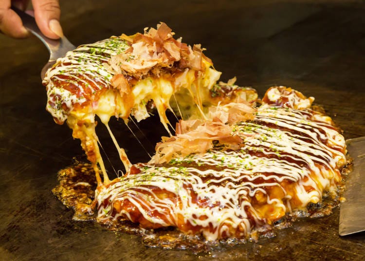 Day Two 12:00 p.m. - What better way to enjoy lunch than by having Osaka classical okonomiyaki in Namba!
