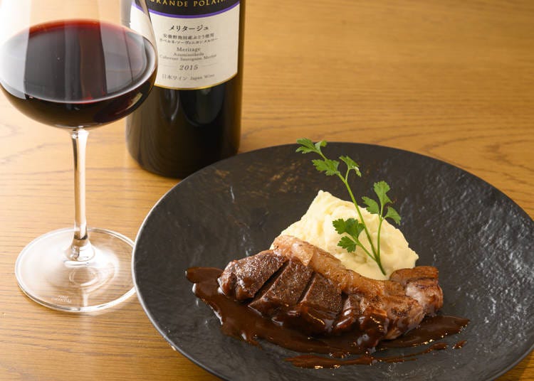 Grilled Hokkaido sika venison in red wine sauce (1,900 yen) with Meritage (1,800 yen per glass)