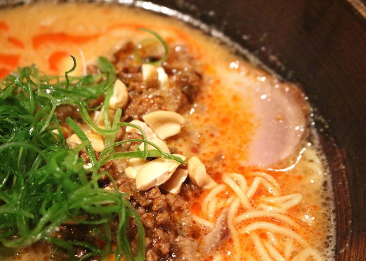 The nuts and miso mixed with ground meat under the spring onion.