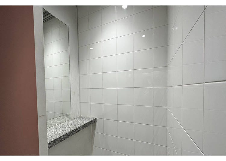 A divided powder room with separate multipurpose restrooms for men and women is available.