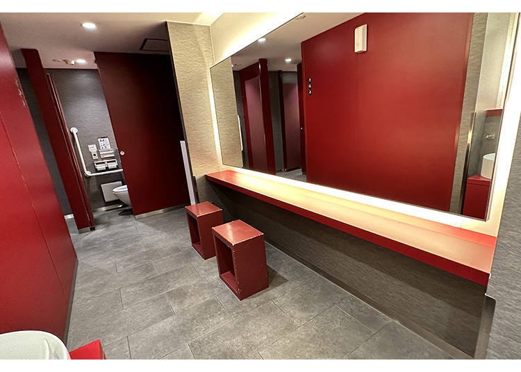 The other women's restroom is stylish and in a red theme!