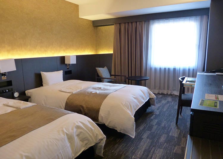 Luxurious Gold and Black Design: The 'Twin & Universal Twin Rooms'