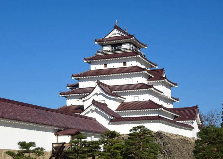 1. Tsuruga Castle: Enjoy the majesty of Japan's red-roofed castle
