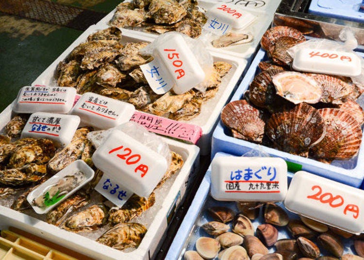 ▲ Containers of oysters and scallops cultivated in the Sanriku area
