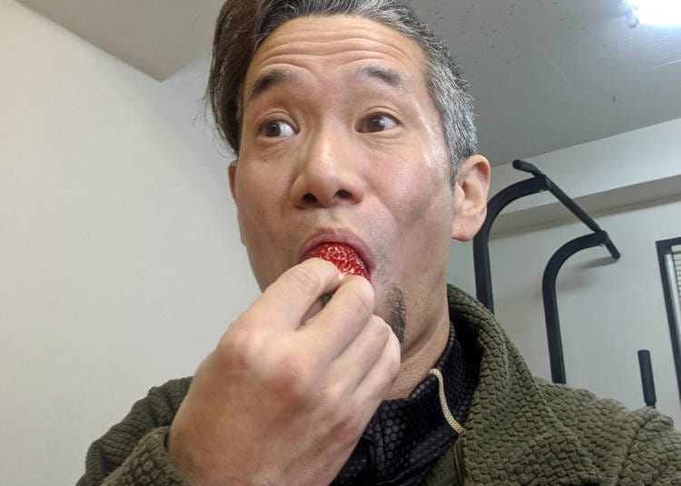 He parted his lips and plunged the strawberry into his mouth.