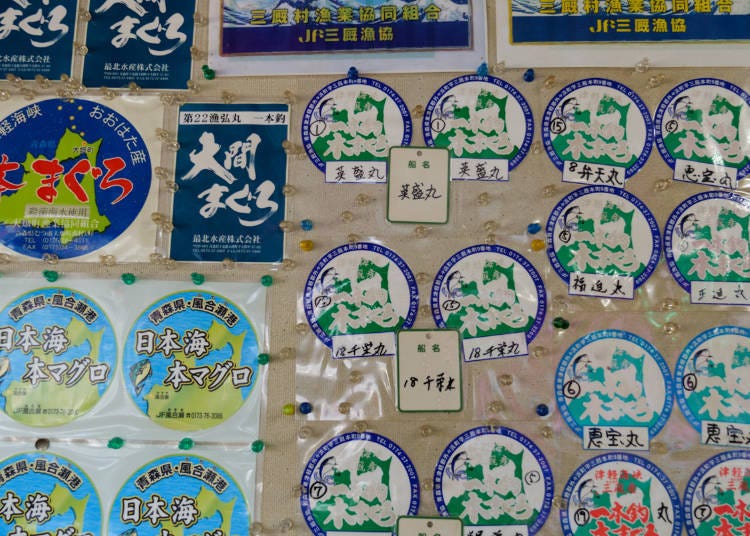 Stickers certifying the place of production of the tuna sold.