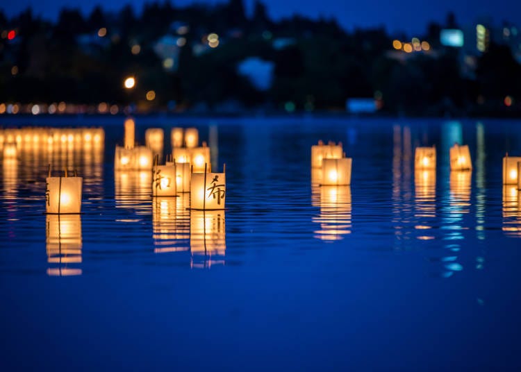 The tradition of floating lanterns down rivers is observed all throughout Japan.