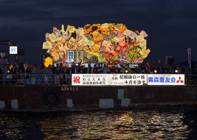 An award winning Nebuta being floated on the sea. (Photo credit: Aomori Tourism Convention Association)