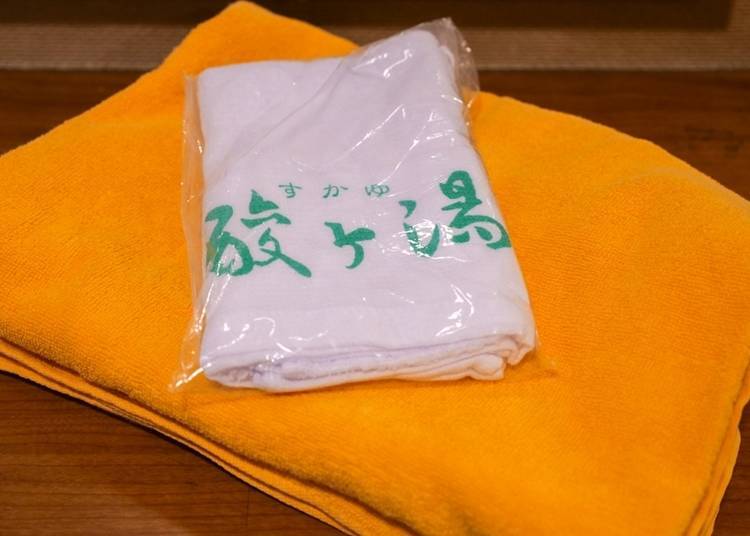 將酸湯溫泉獨創的毛巾帶回家當成旅行的回憶