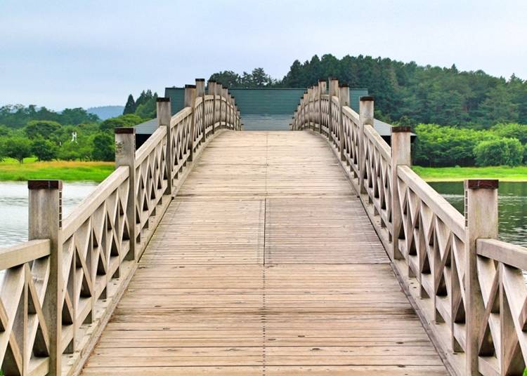 Wooden triple arch bridge made using Hiba wood from Aomori prefecture