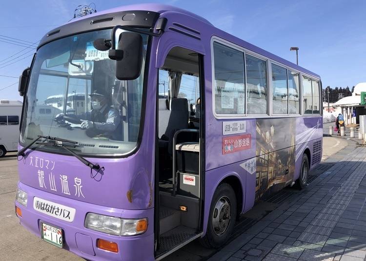 This mid-sized purple bus will take you to Ginzan Onsen!