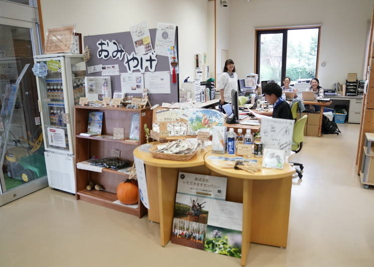 Staff of the Itadakimasu Company smile for the camera