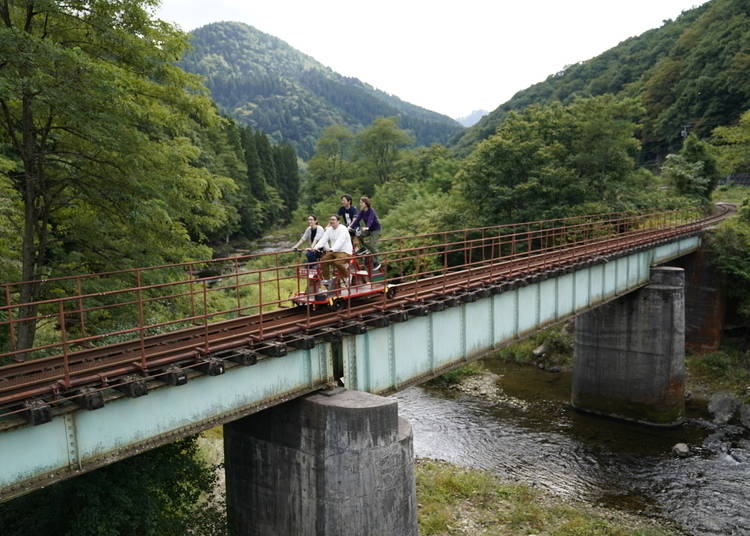 Crossing a bridge on a railbike
