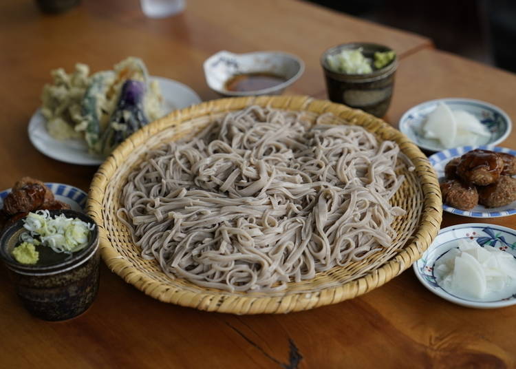 The soba tastes excellent, despite the student's uneven slicing