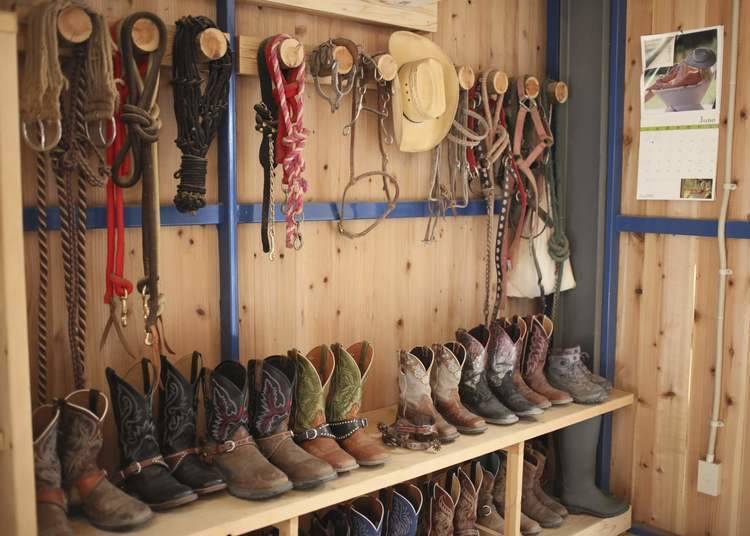 Patrons can borrow authentic riding boots and headgear at Sunshine Stables