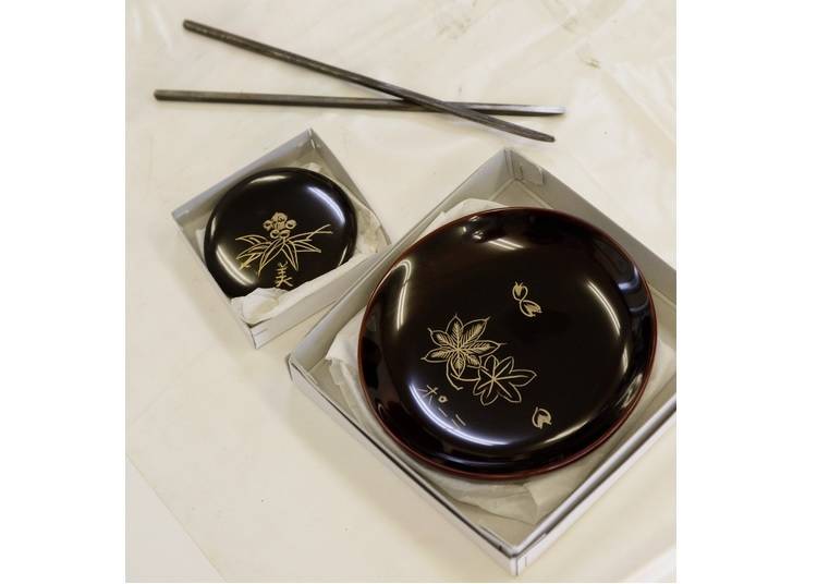 A mirror and small dish made with help from Mitsugu