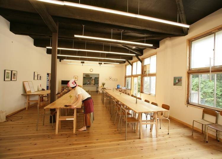 Sansho House's dining area promotes shared experiences through classroom-style seating