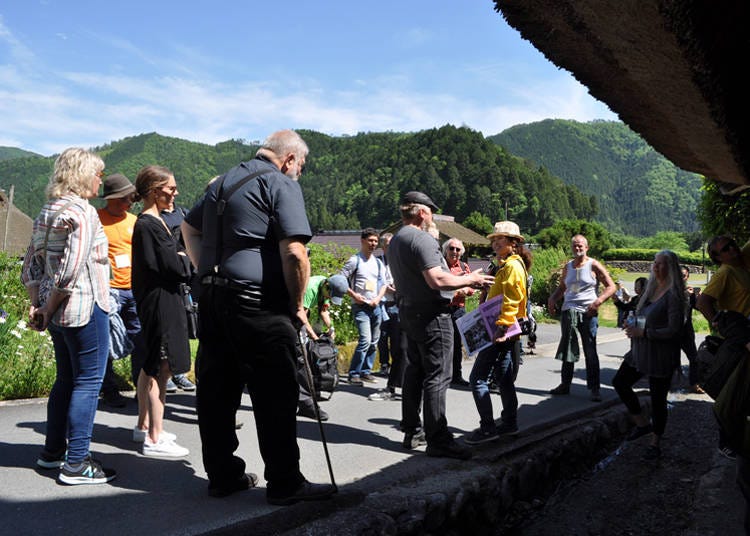 Visitors learn about the village's history and lifestyles