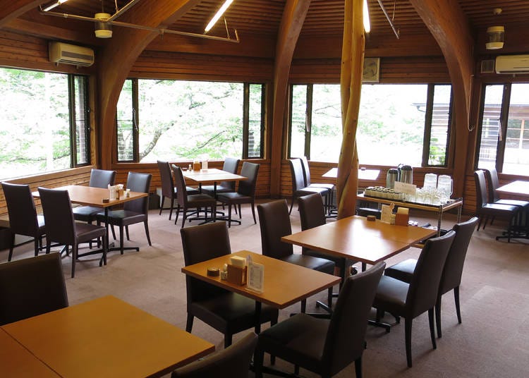 The dining room offers verdant views of the surrounding area