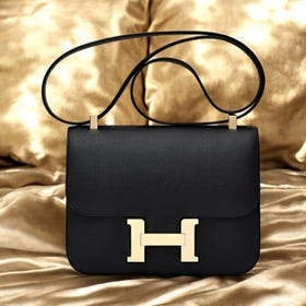 HERMES.
Constance 24 Epson，黑色，黃金配件，W刻