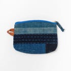 BORO FABRIC wallet

This wallet is made with sashiko on scraps of indigo-dyed old cloth "BORO" and finished with a random patchwork that complements each piece of cloth.