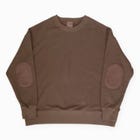 Original Sweat Elbow patch - Chocolate Brown

This crew neck sweatshirt features subtly accented sashiko elbow patches, offering a simple yet playful design.