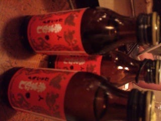 お通しの赤マムシドリンク