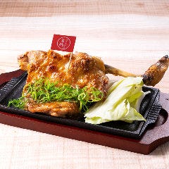 清流若どり 骨付きモモ一本焼き ガーリックソース 旨唐揚げと居酒メシ ミライザカ ルルサス防府店_清流若どり 骨付きモモ一本焼き ガーリックソース