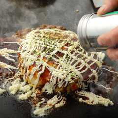 しっかりと混ぜ合わせたお好み焼きはふわっふわトロトロの絶品。