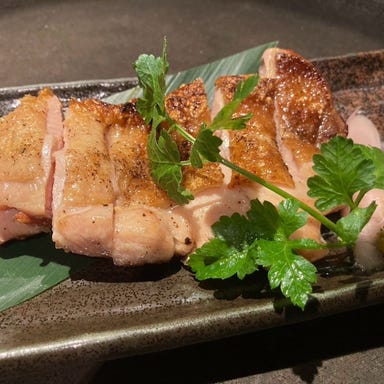 炭火炙り焼と地酒 いぶしぎん 五井本店_鶏もも燻し焼き 柚子胡椒添え