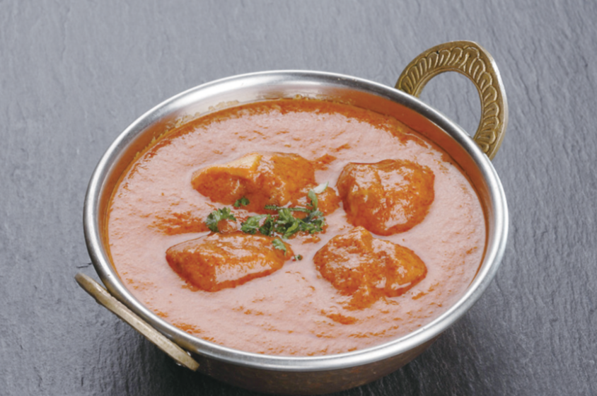 ナンにカレーやサラダドリンクがセットになったAセットの一部