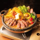厚切り牛ステーキの石焼メキシカンチーズ鍋